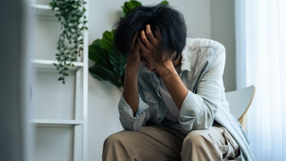 Person Suffering Stress - Shanti Mindcare Blog